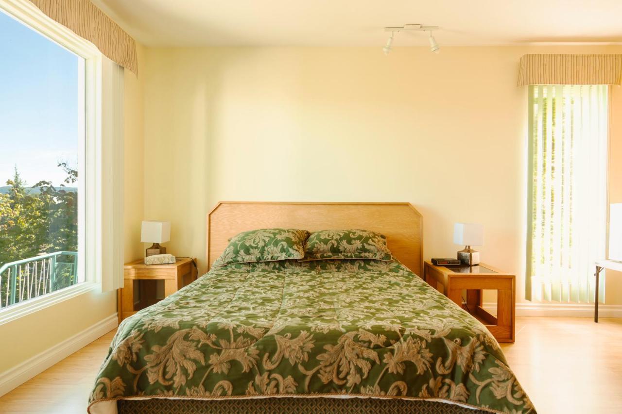 Auberge De La Riviere Saguenay Ла-Бе Экстерьер фото