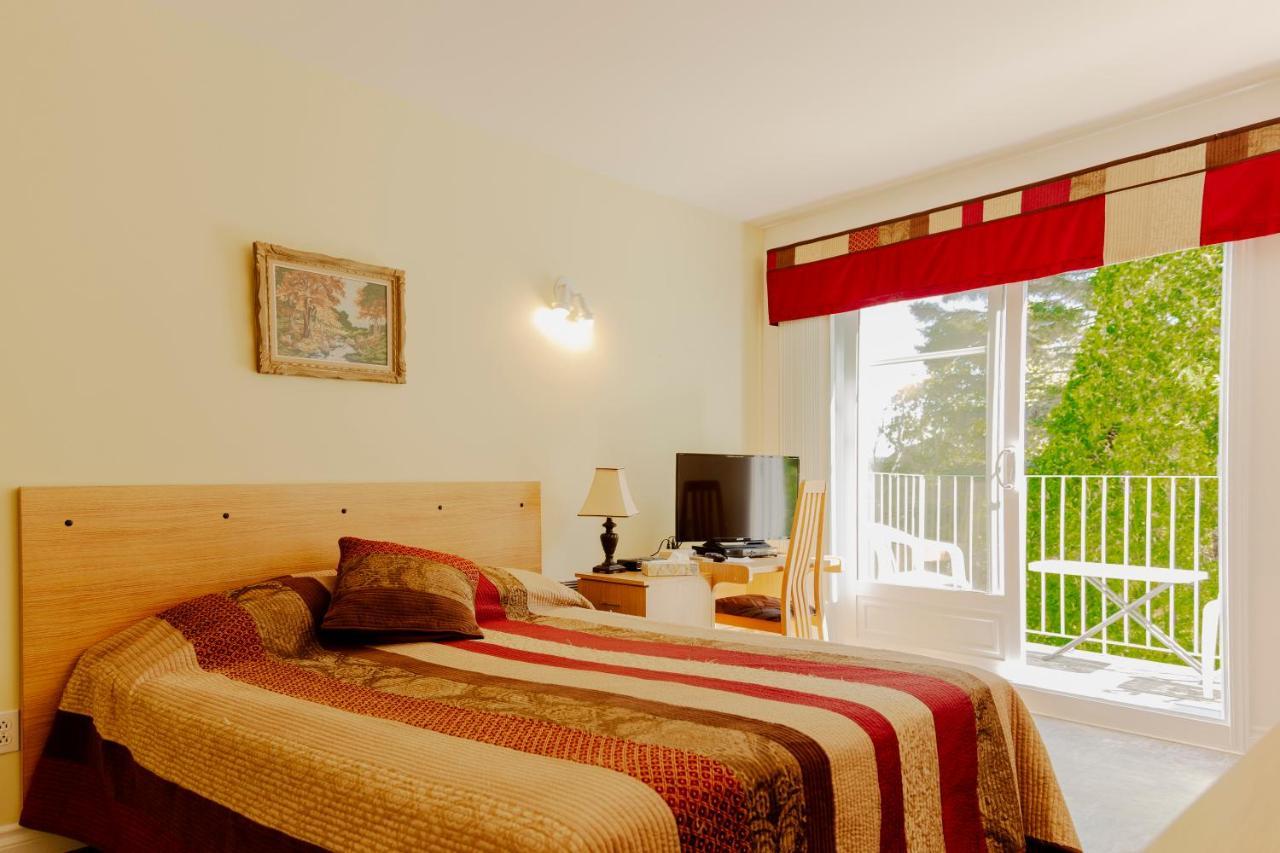 Auberge De La Riviere Saguenay Ла-Бе Экстерьер фото