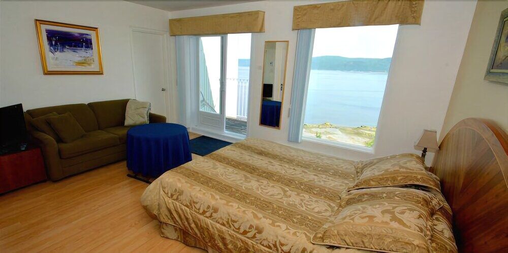 Auberge De La Riviere Saguenay Ла-Бе Экстерьер фото